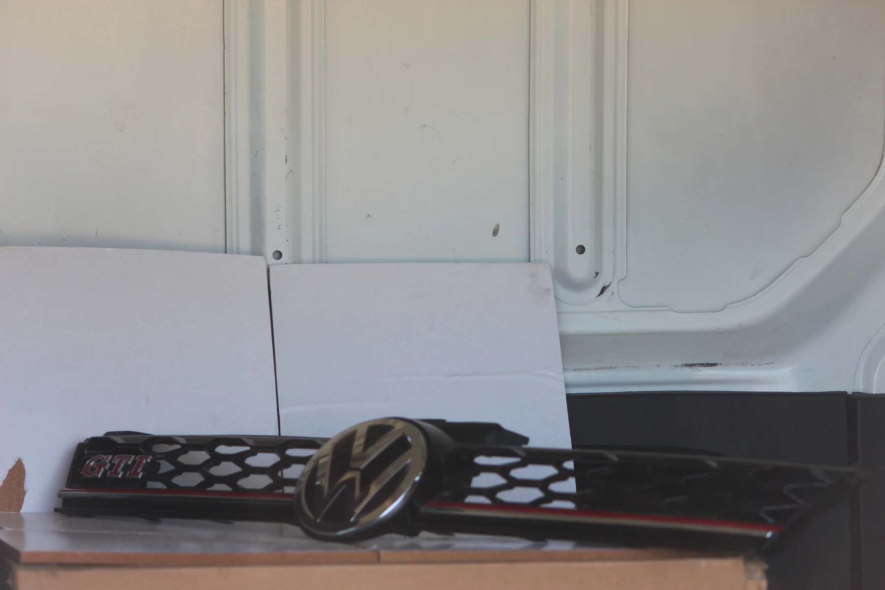 VW Golf Mk7 GTI upper front grille with VW and GTI badges